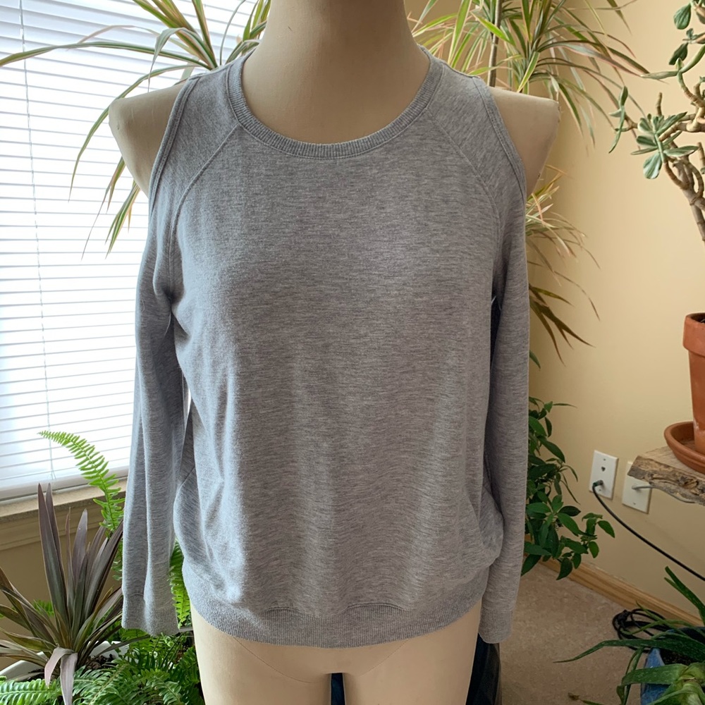 Grey sweatshirt with shoulder cut outs